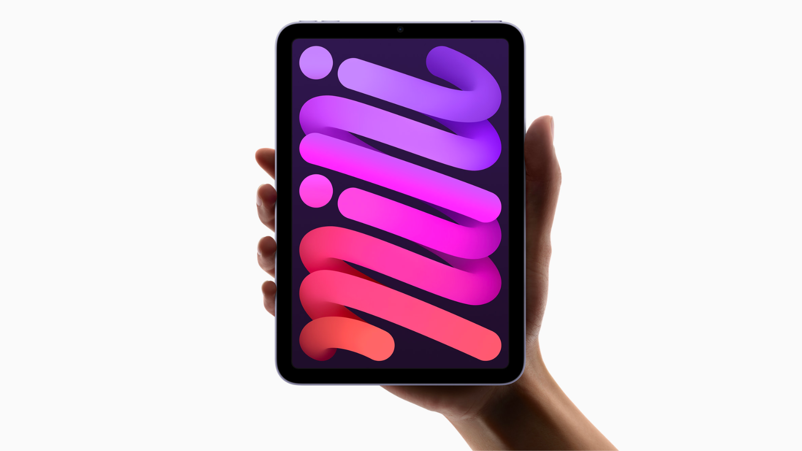 a close-up of a person holding an apple ipad mini against a light gray background