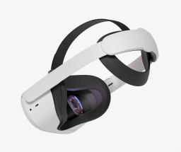 The Meta Quest 2 headset with the Elite Strap attached.The sides of the strap are white plastic, the third bit that goes across the top of your head is black velcro.