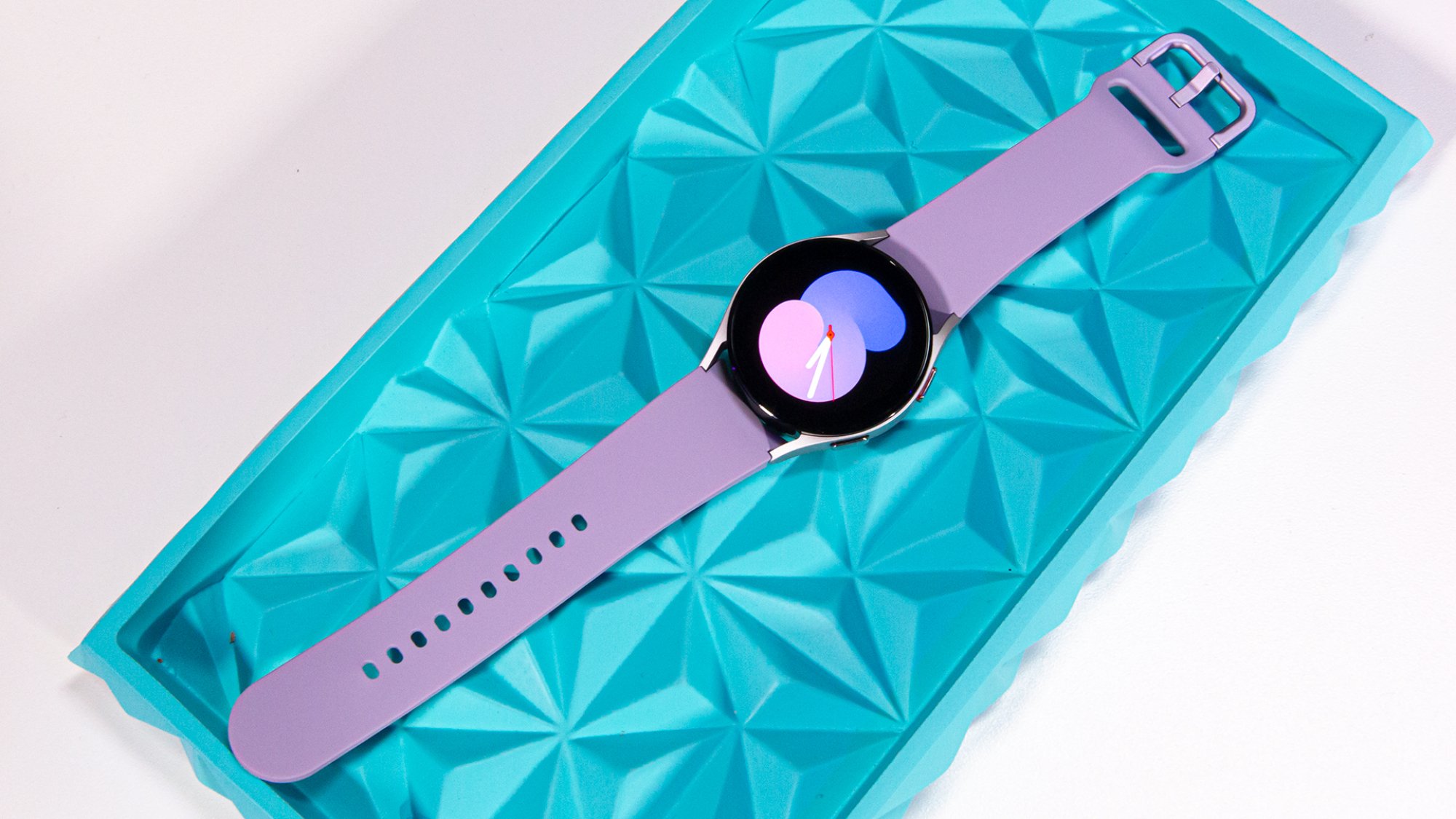 The Galaxy Watch 5 smartwatch with purple watch band