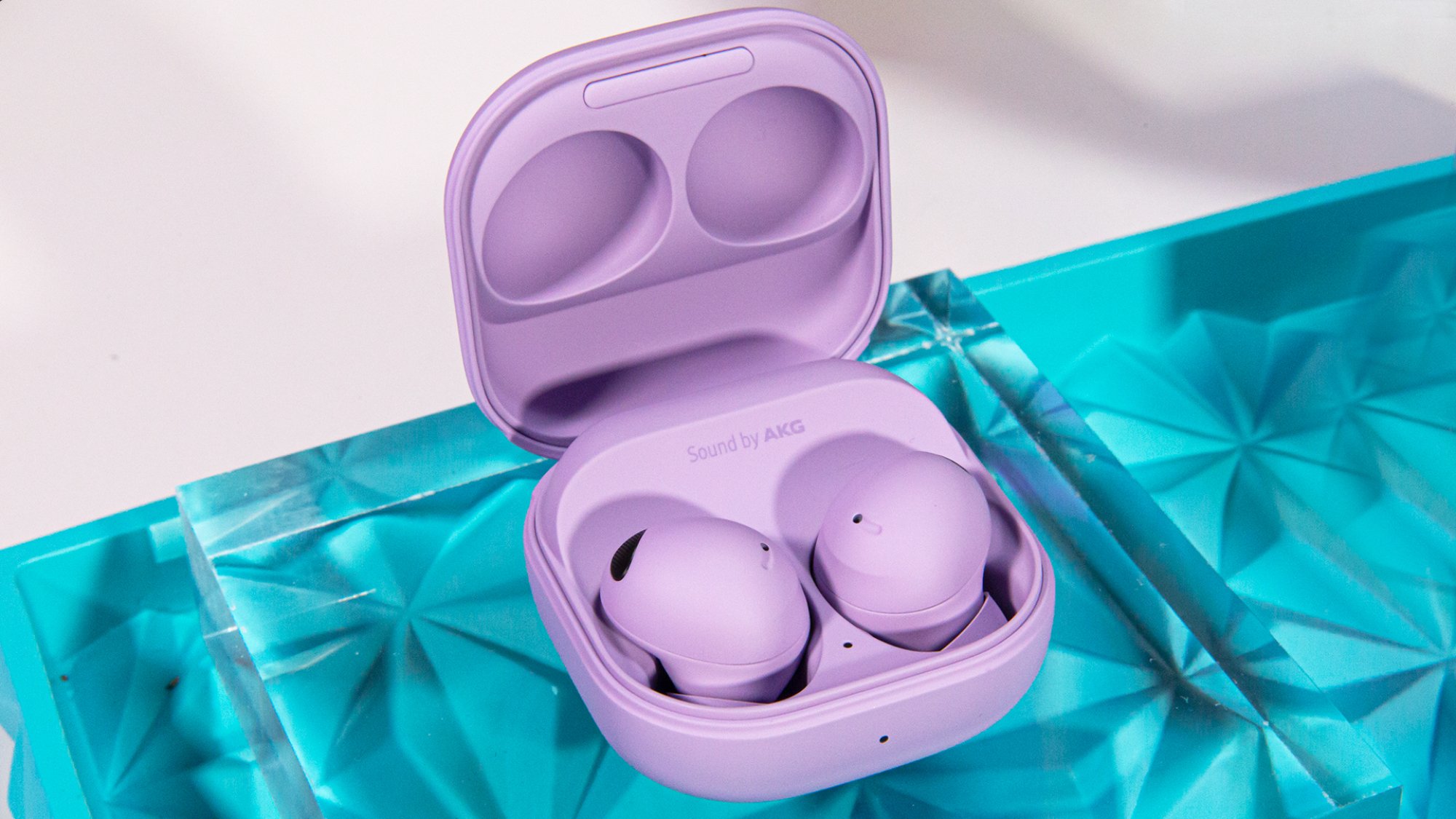 The Galaxy Buds 2 Pro earbuds in purple with case opened