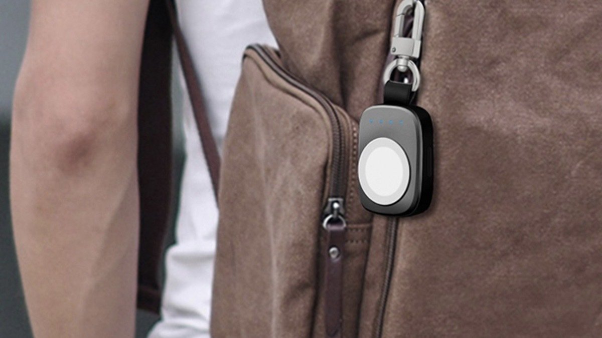Apple Watch Wireless Charger Keychain on a backpack.