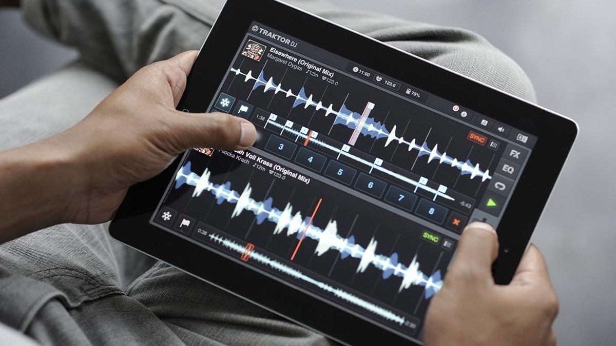 Person holding a Refurbished iPad Air.