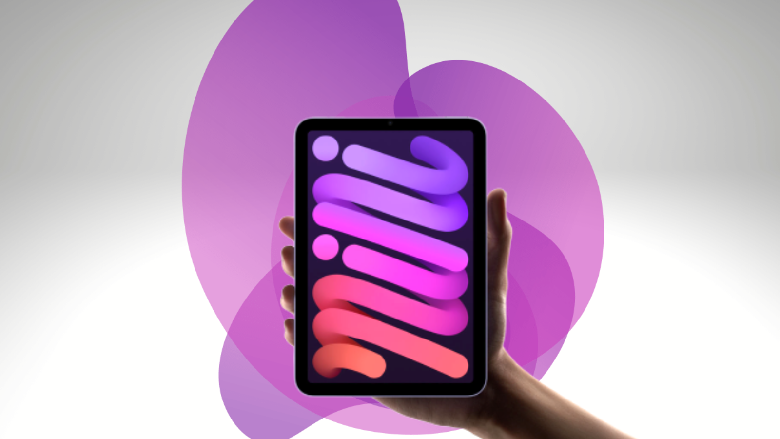 hand holding up apple ipad mini