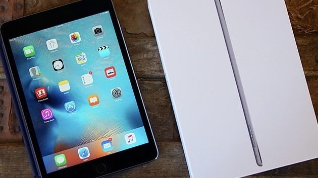 Refurbished Apple iPad mini 4 on a table.