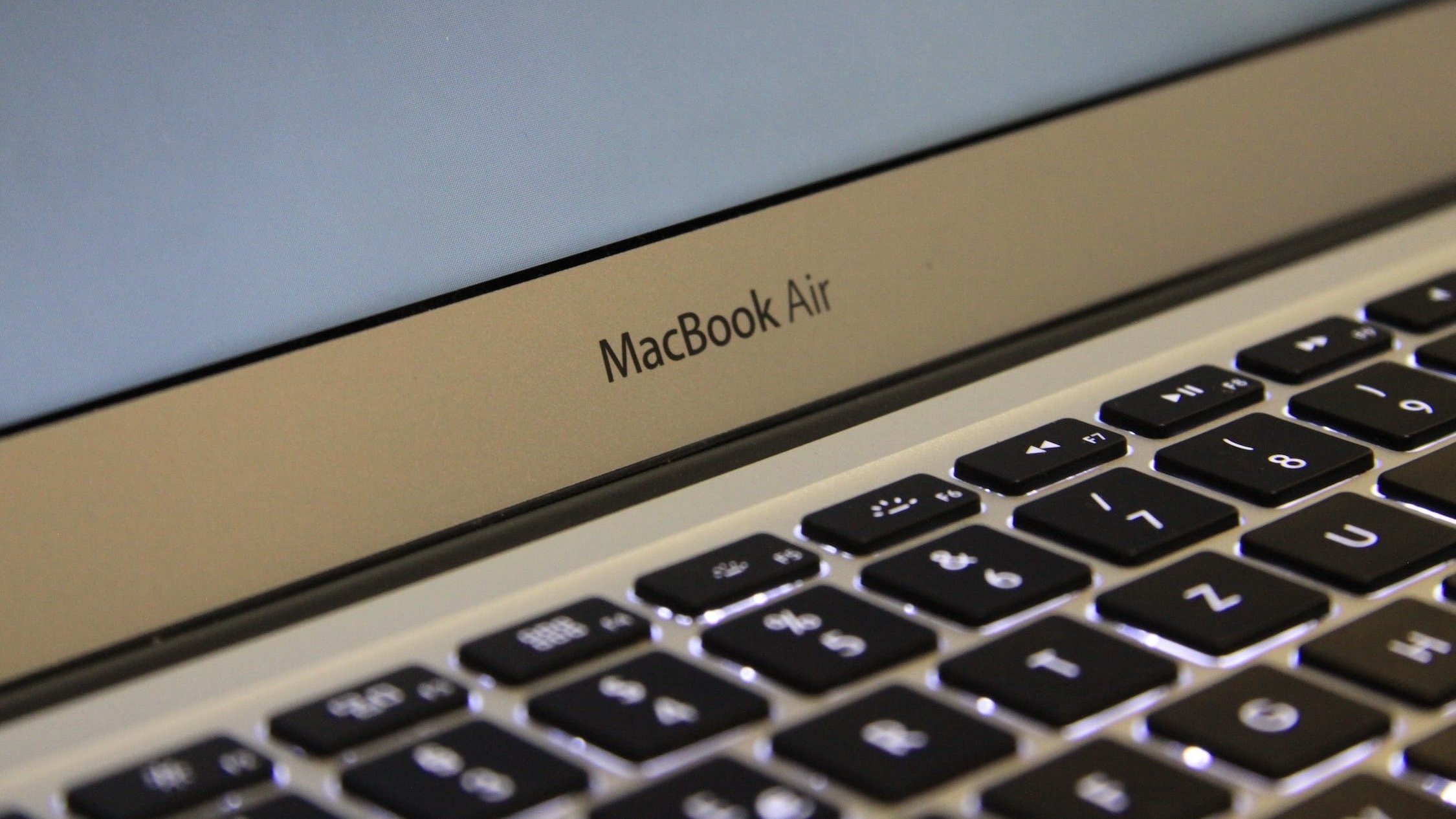 Zoomed in photo of a MacBook Air.