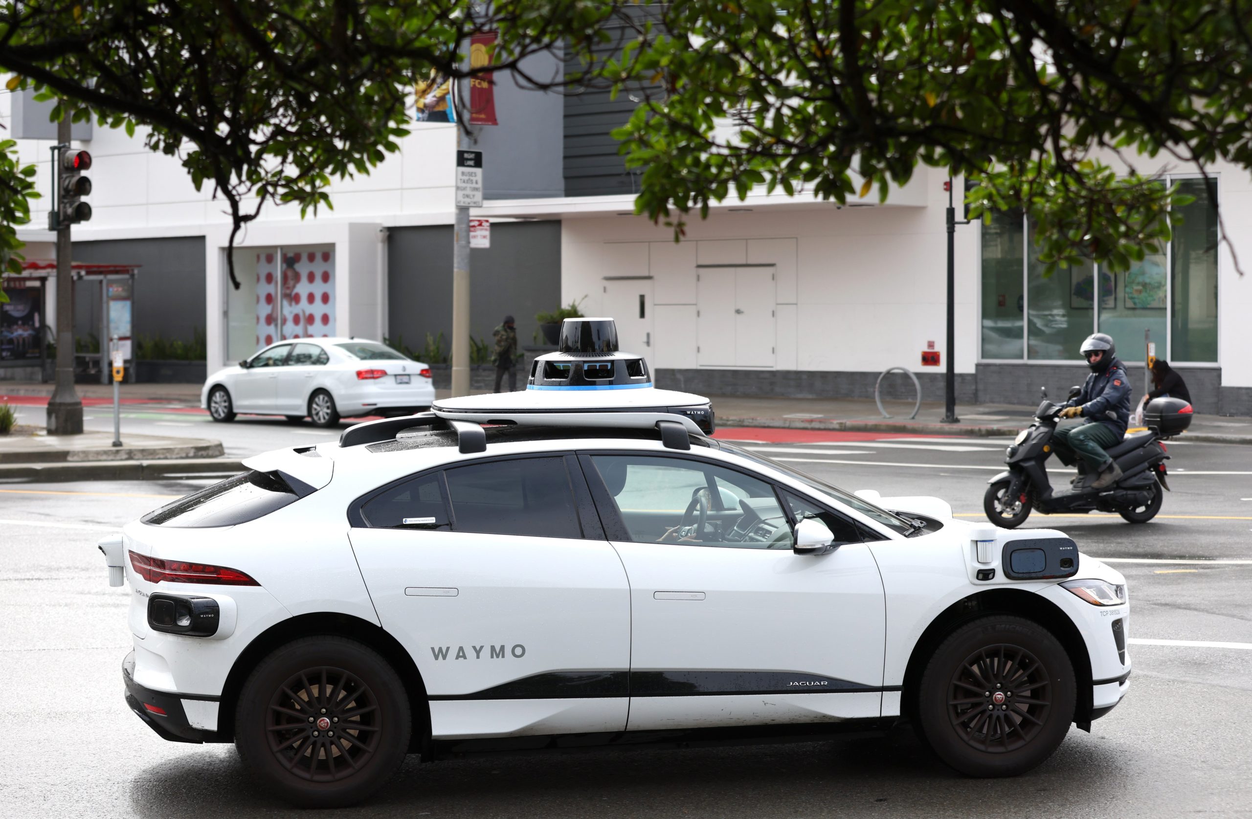 a Waymo autonomous car on San Francisco's Masonic Avenue in 2022.