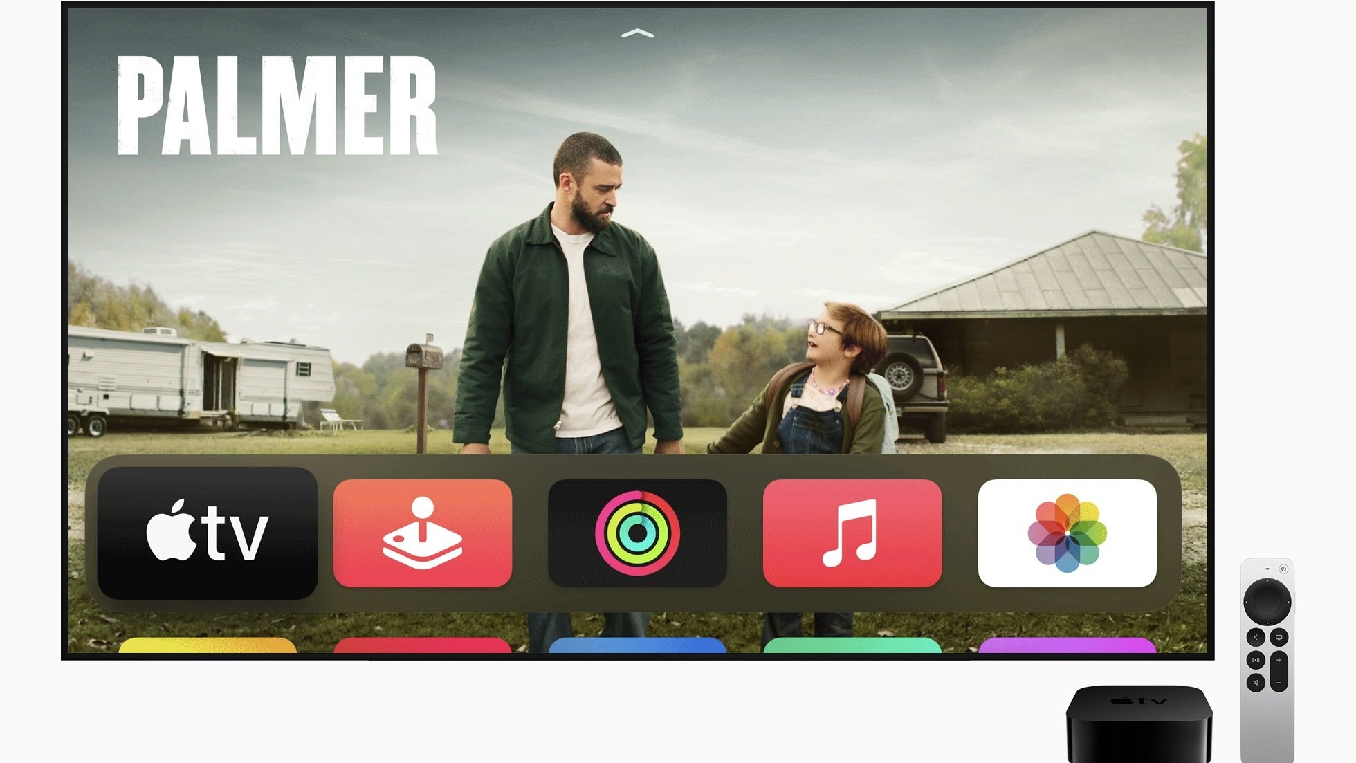 tv with tvos16 up and apple tv with remote next to it