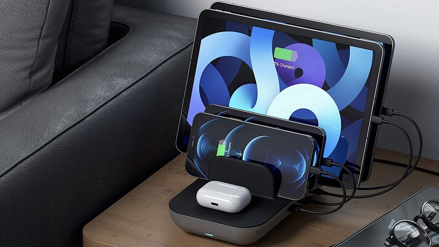Satechi Dock5 Multi-Device Charging Station with Wireless Charging on a table.