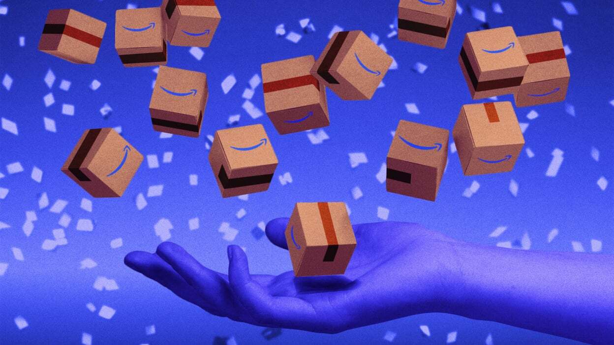 Hand throwing up Amazon boxes