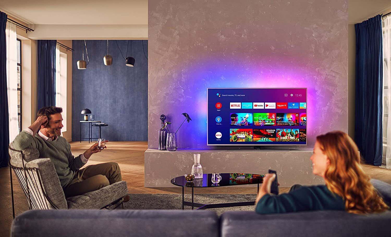 A couple watching television