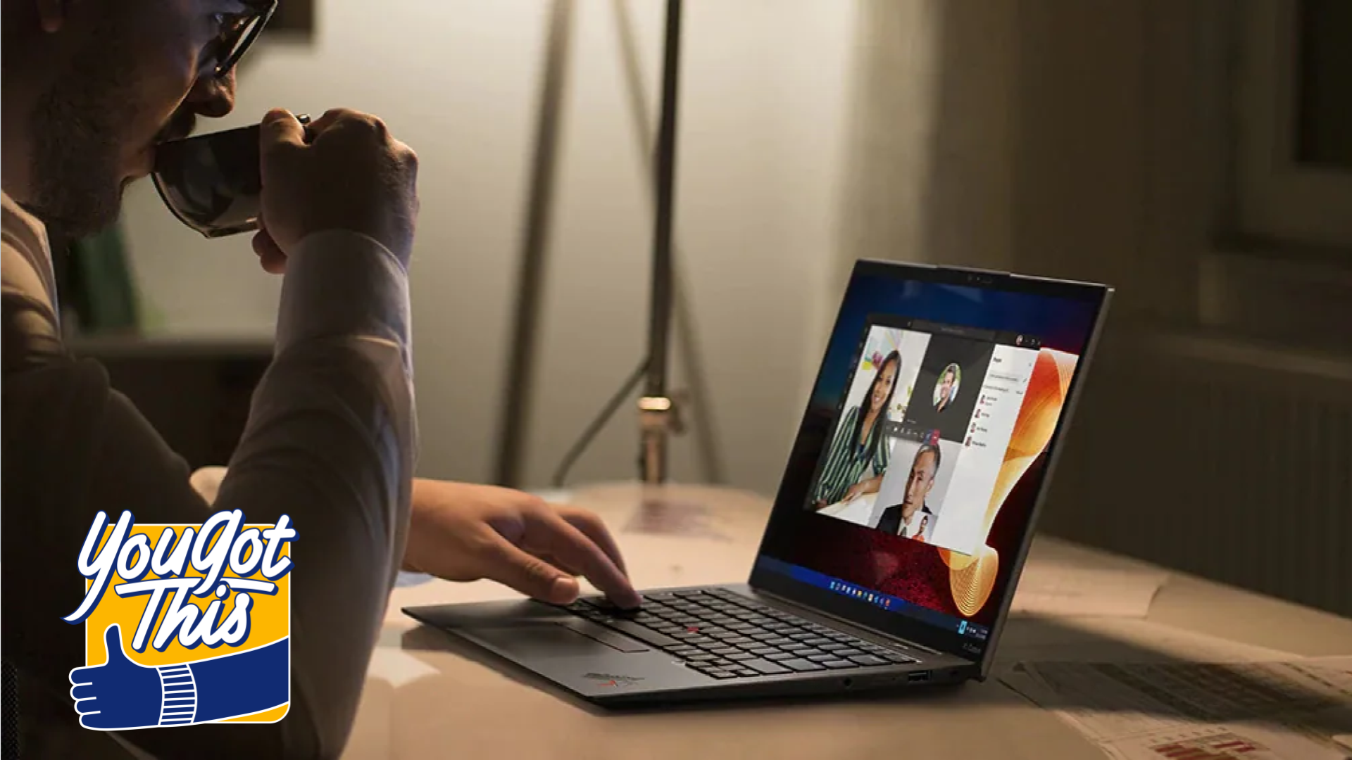 Person sipping out of mug while on video call