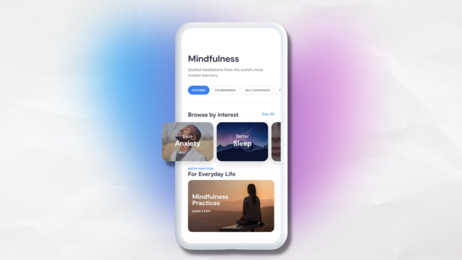 phone with mindfulness.com subscription against white purple and blue background