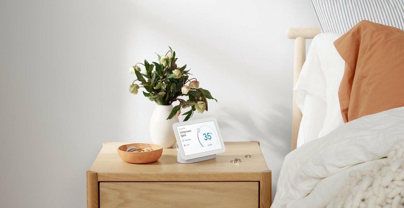 Google nest hub on a nightstand