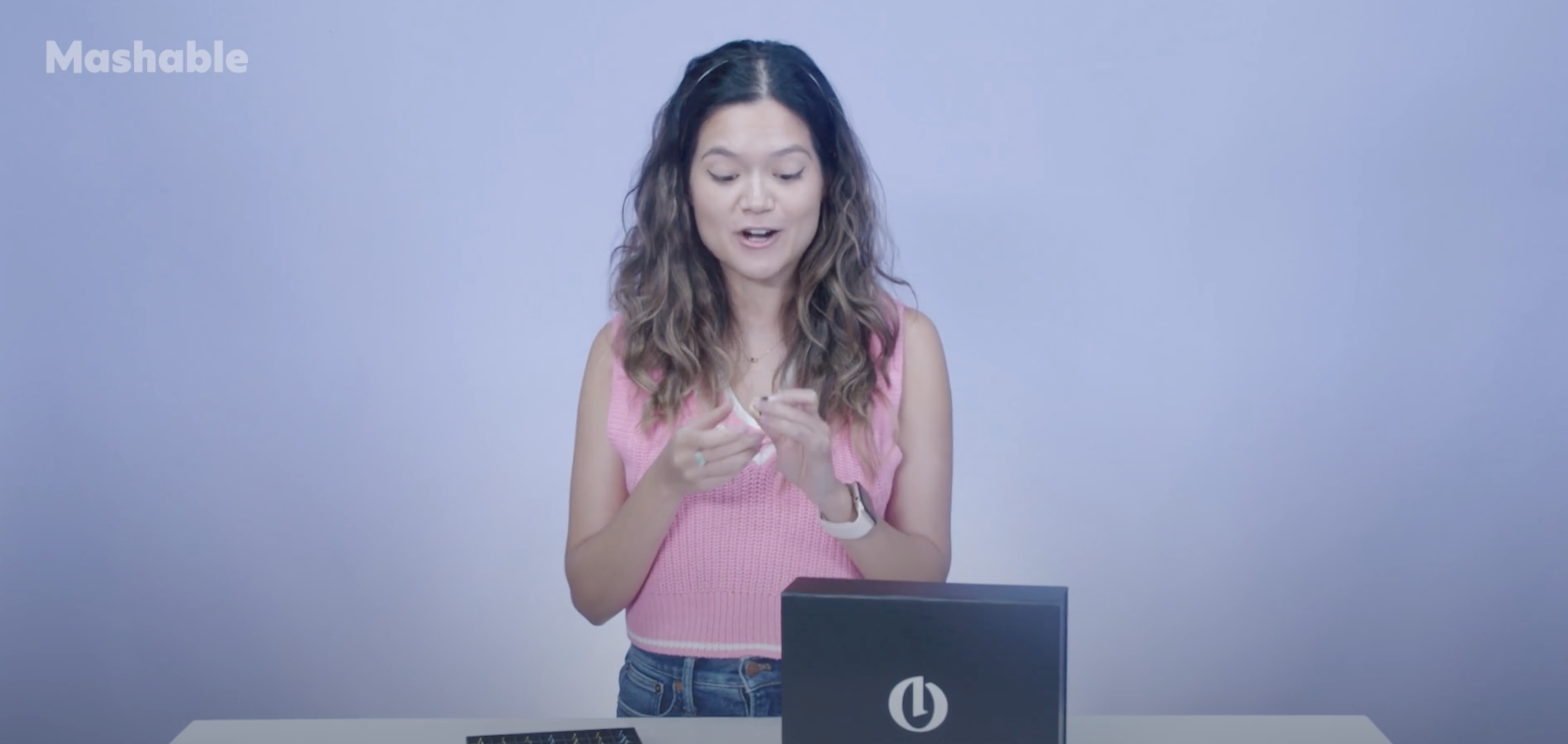 A woman with the Opulus retinol product. 