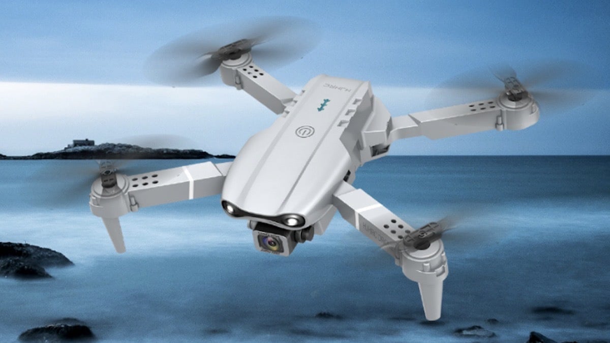 A drone from the Alpha Z PRO 4K and Flying Fox 4K Wide Angle Dual Camera Drones Bundle in the sky.