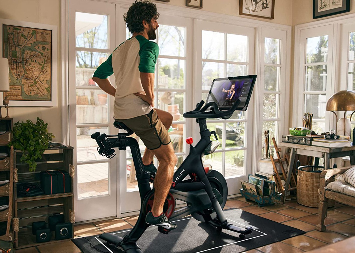 Man using Peloton bike