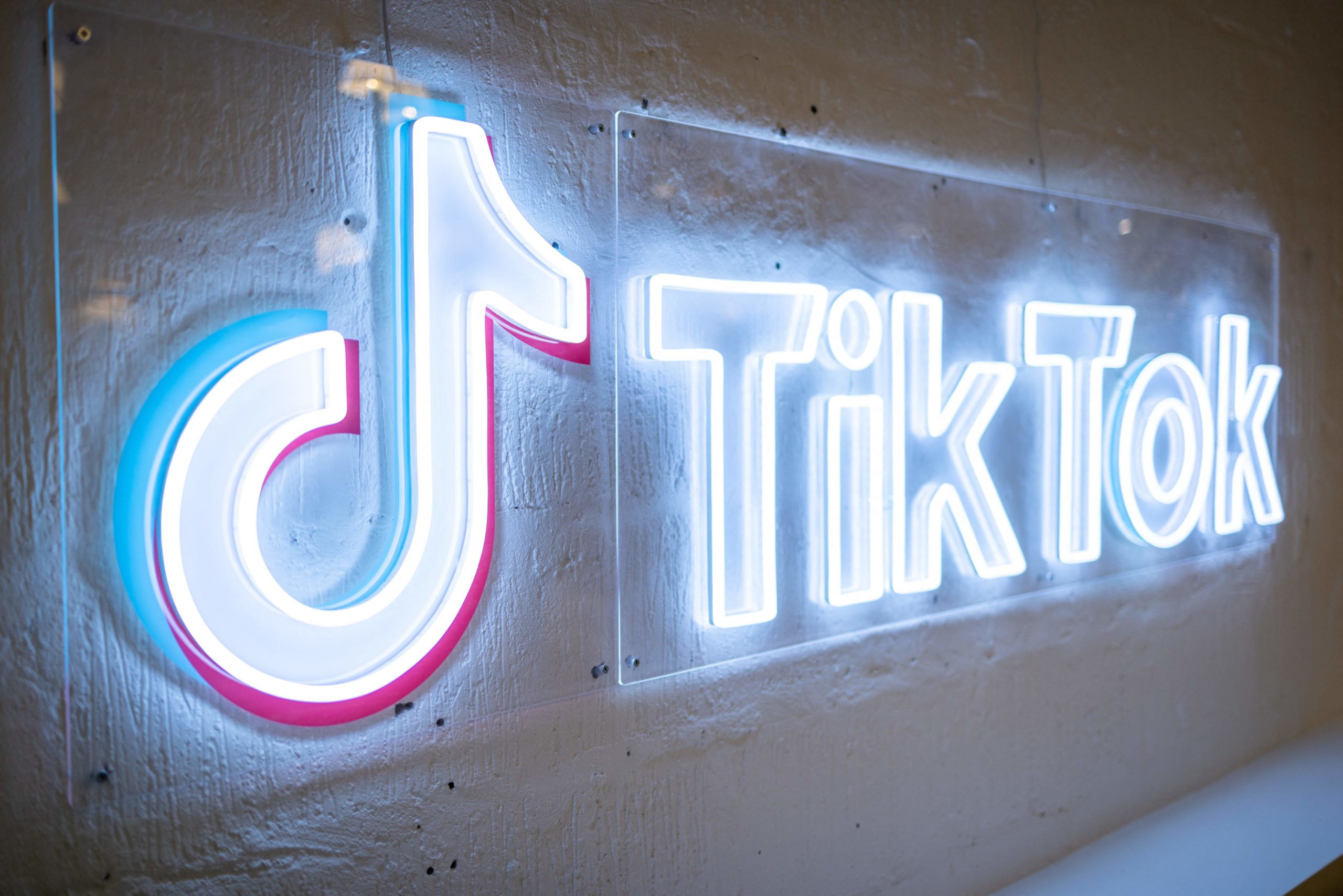 Light-up TikTok sign.