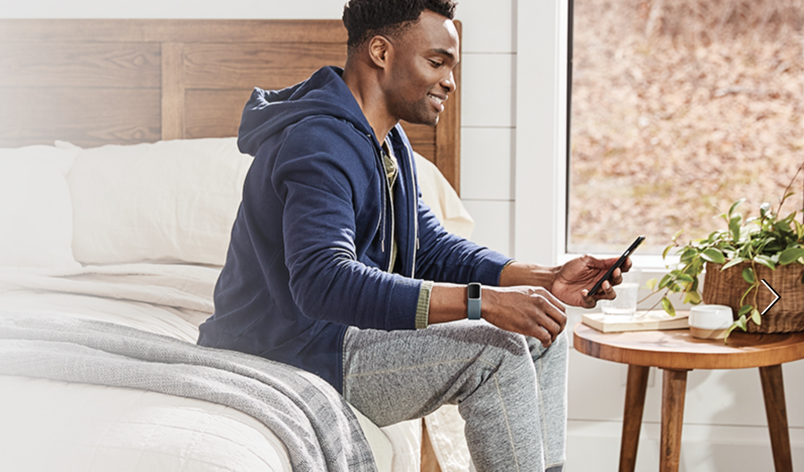 Man wearing a Fitbit 5