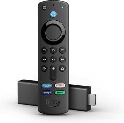 Amazon Fire TV Stick 4K with television adaptor laying sideways