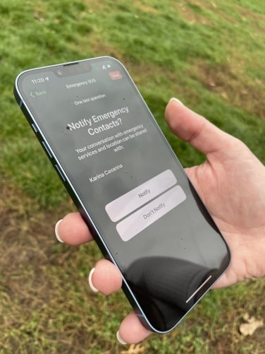 emergency sos via satellite asking to notify emergency contacts on iPhone 14