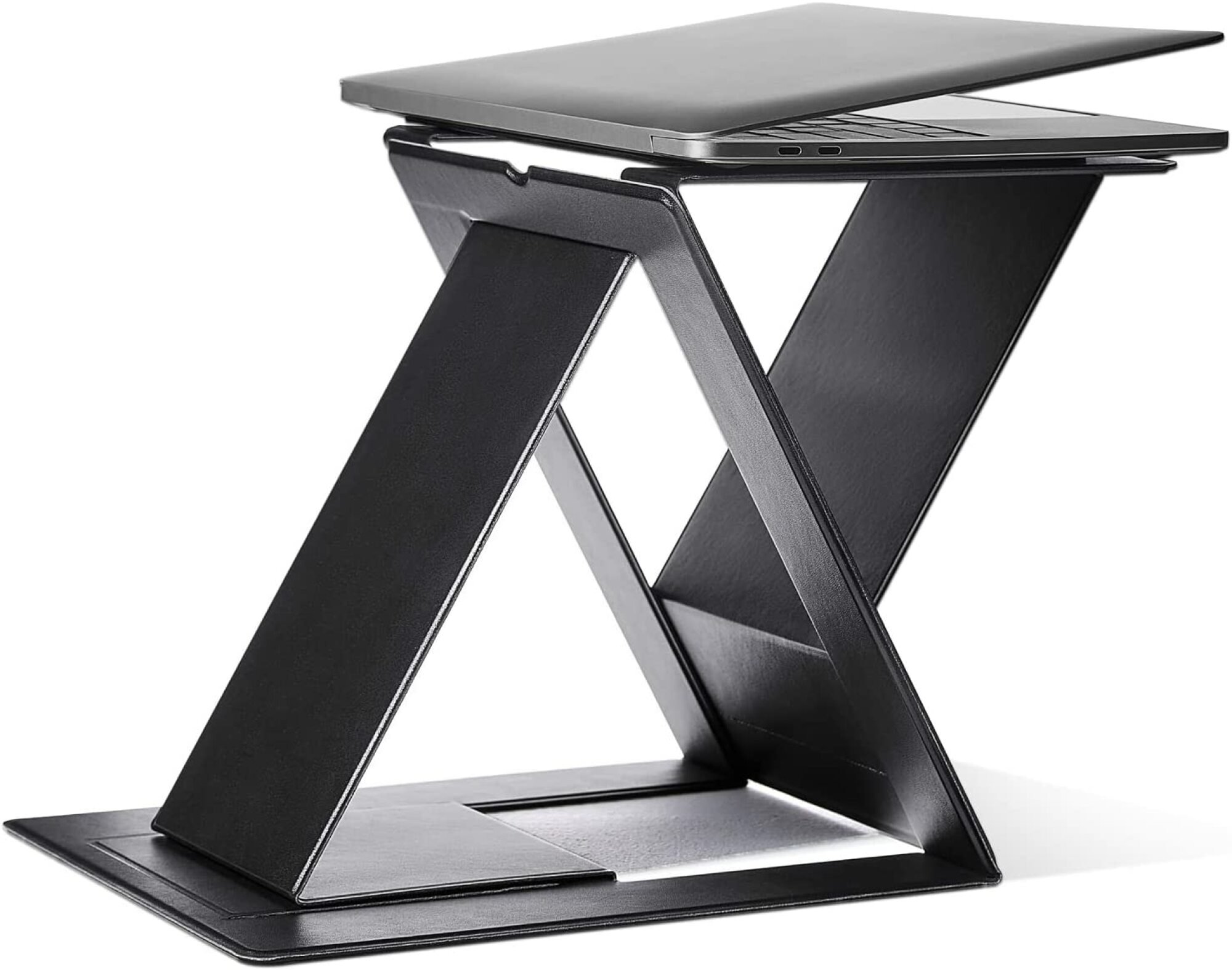 Moft foldable laptop stand with a laptop on it