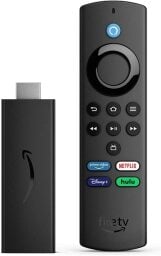 Amazon Fire TV Stick Lite beside its television adaptor