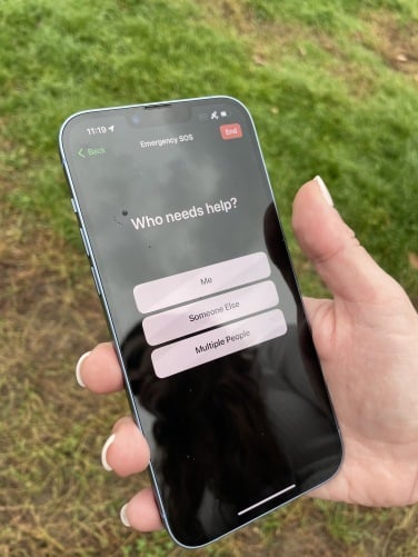 emergency sos via satellite asking who needs help on iPhone 14