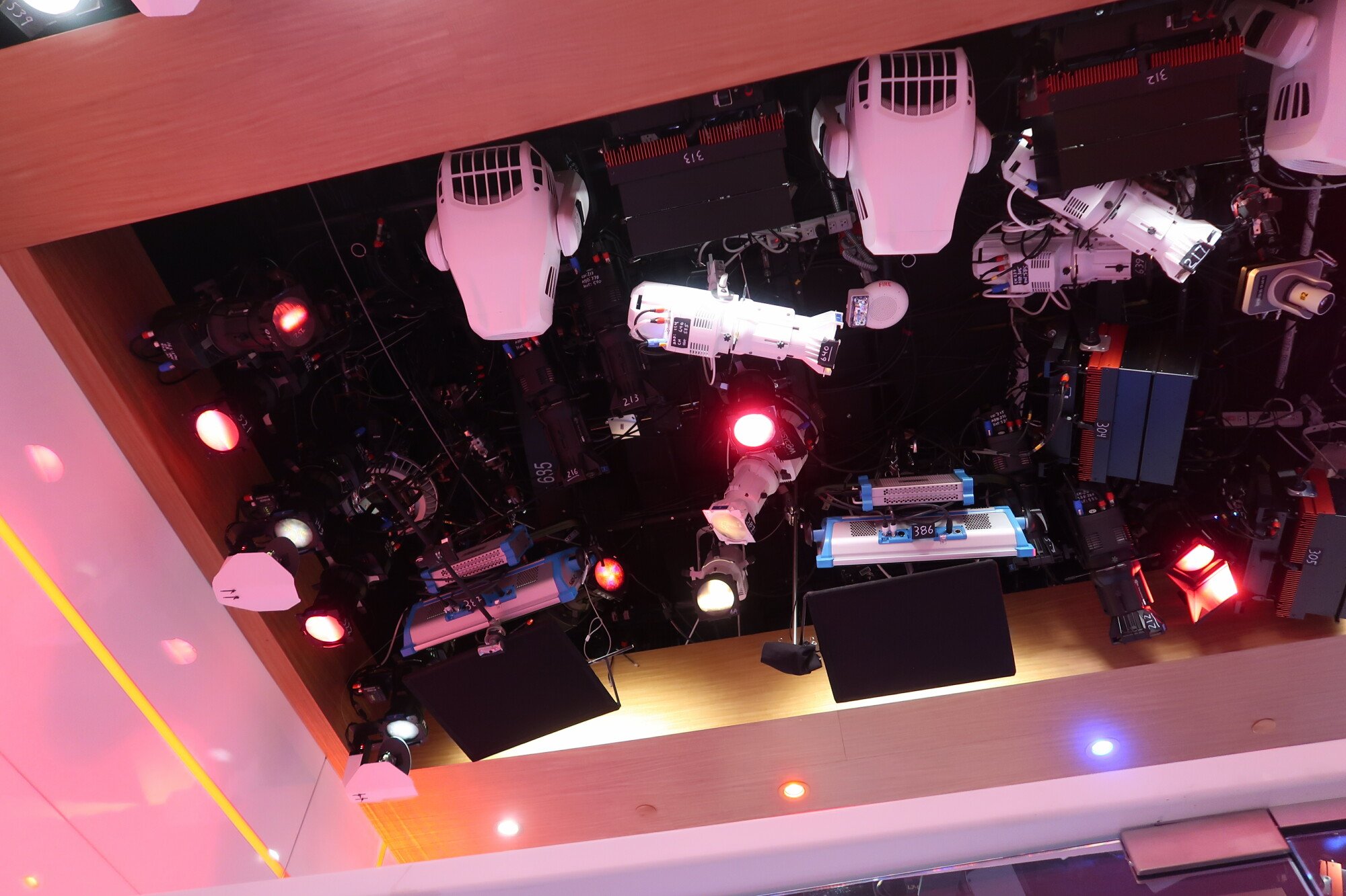 the ceiling of the 3A studio which accommodates dozens of stage lights.