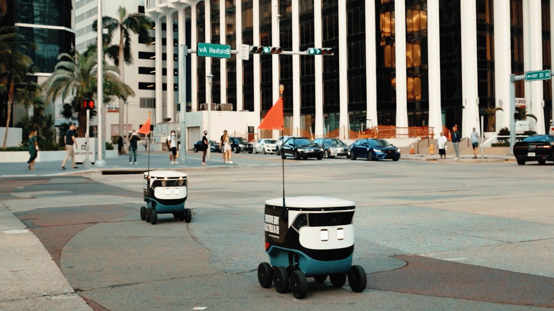 Cartken autonomous robots crossing a street in Miami