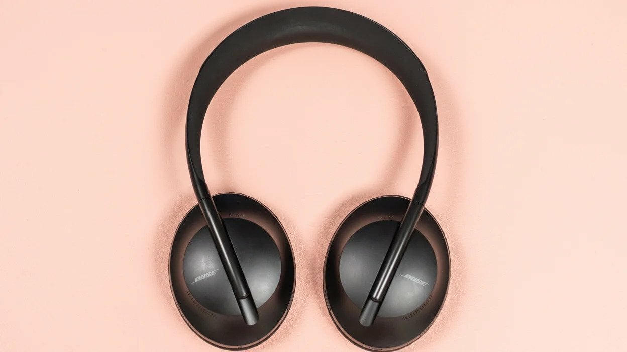 Bose Noise Cancelling Headphones 700 on salmon background