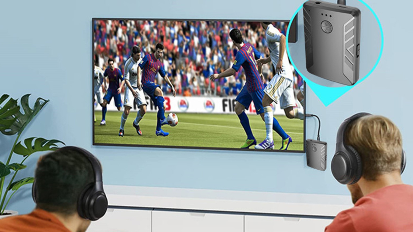 two guys watching soccer via bluetooth transmitter device