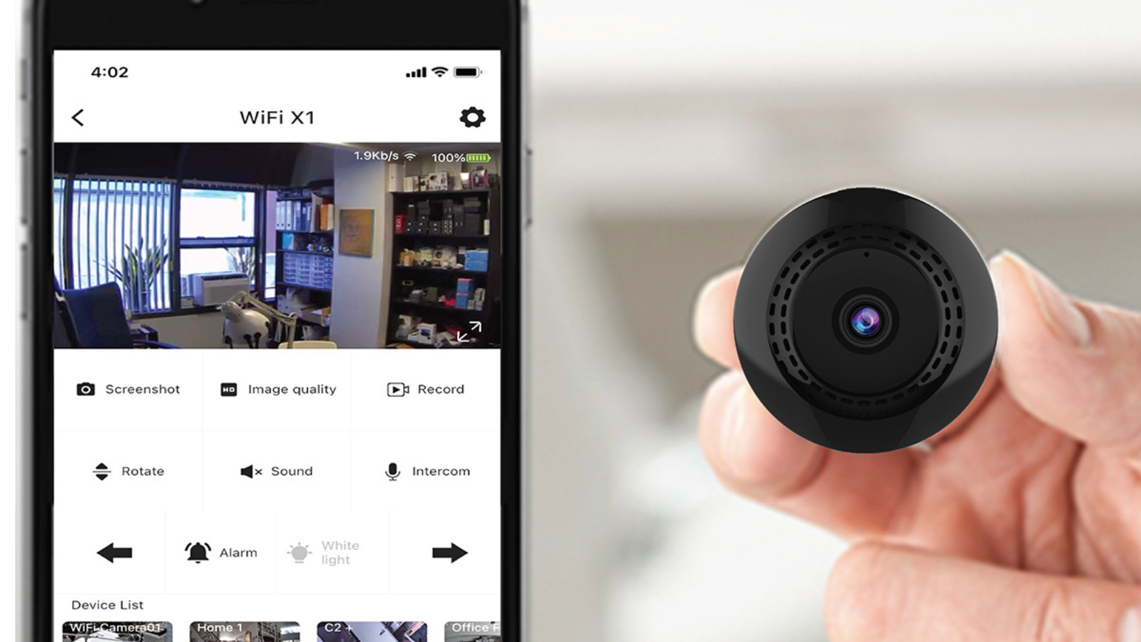 hand holding tokk cam c2+ next to phone app