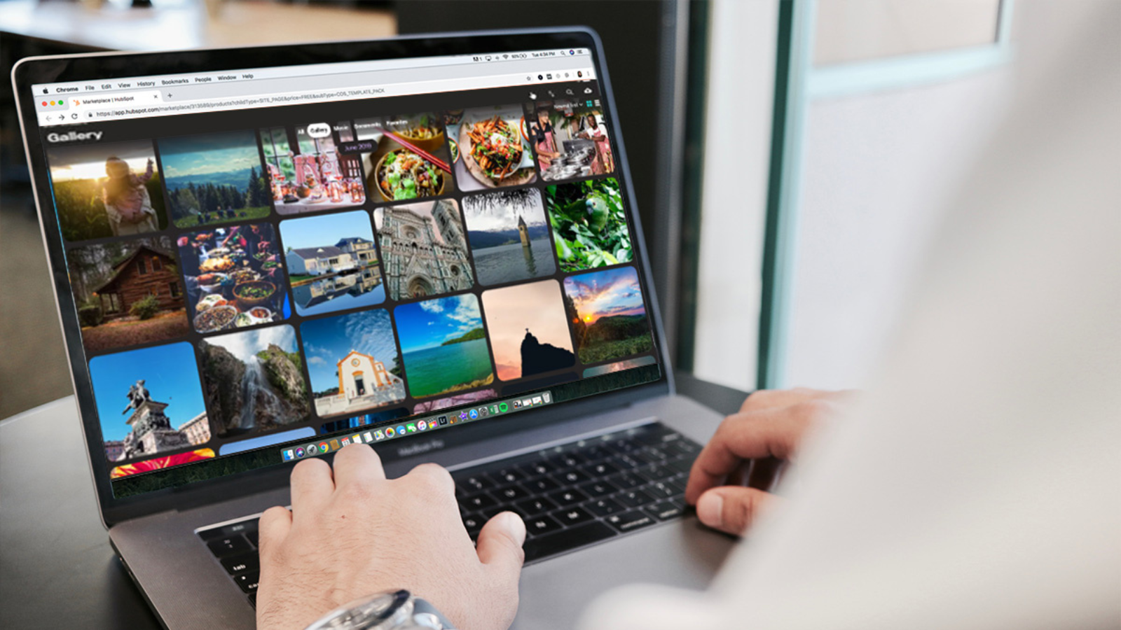 person using laptop to store photos