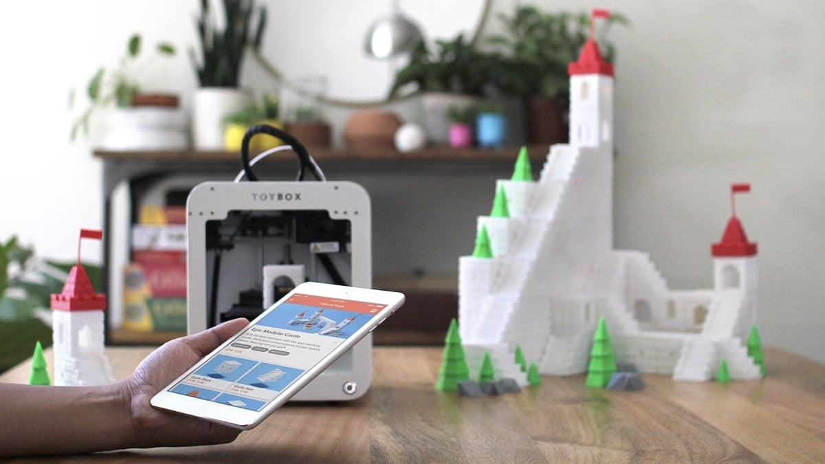 Someone using the Toybox 3D Printer Deluxe Bundle to make a castle.