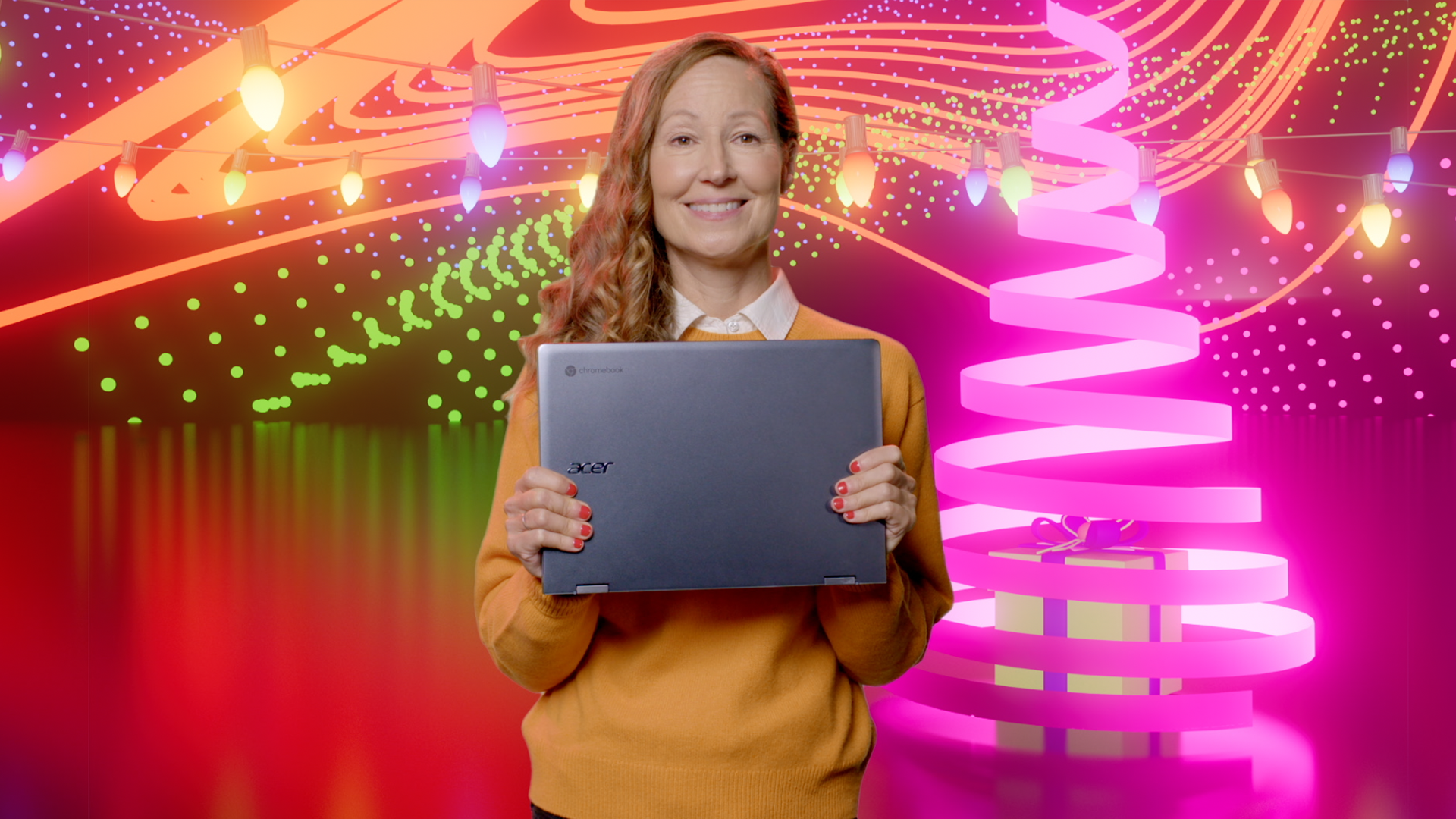 A woman holds the Acer Chromebook