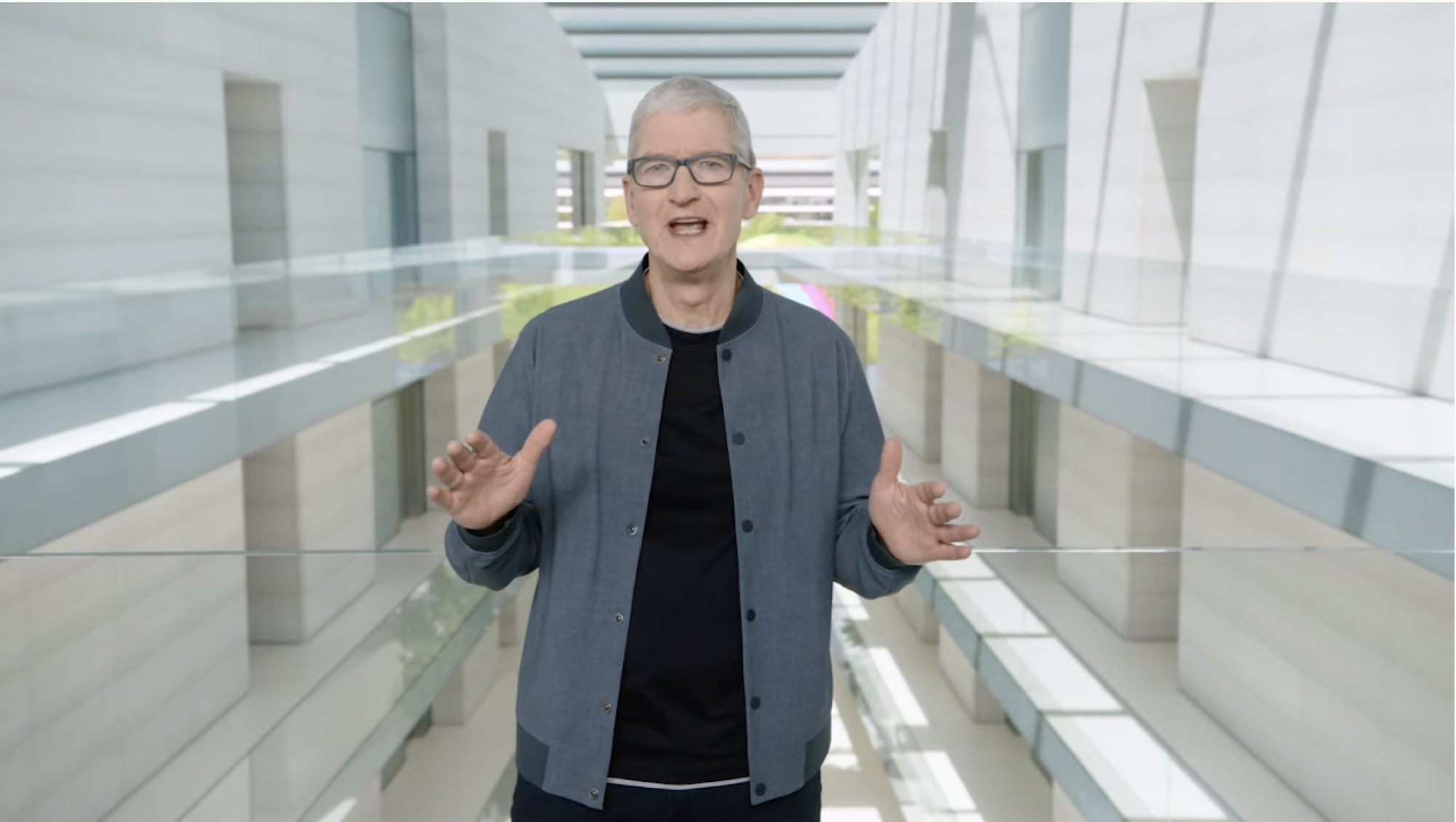 Tim Cook at Apple Park wearing a bomber jacket