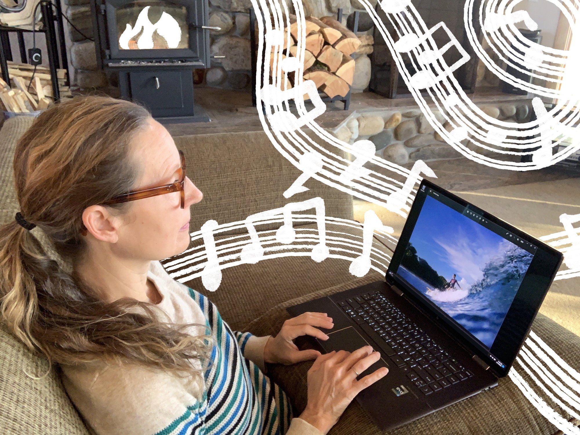 Author on couch with laptop