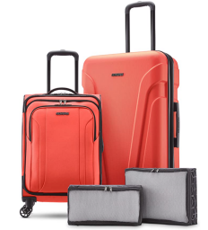 4 piece luggage set, two in red, two in grey, against a white bacgrkound