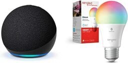 A black smart speaker with a smart color bulb