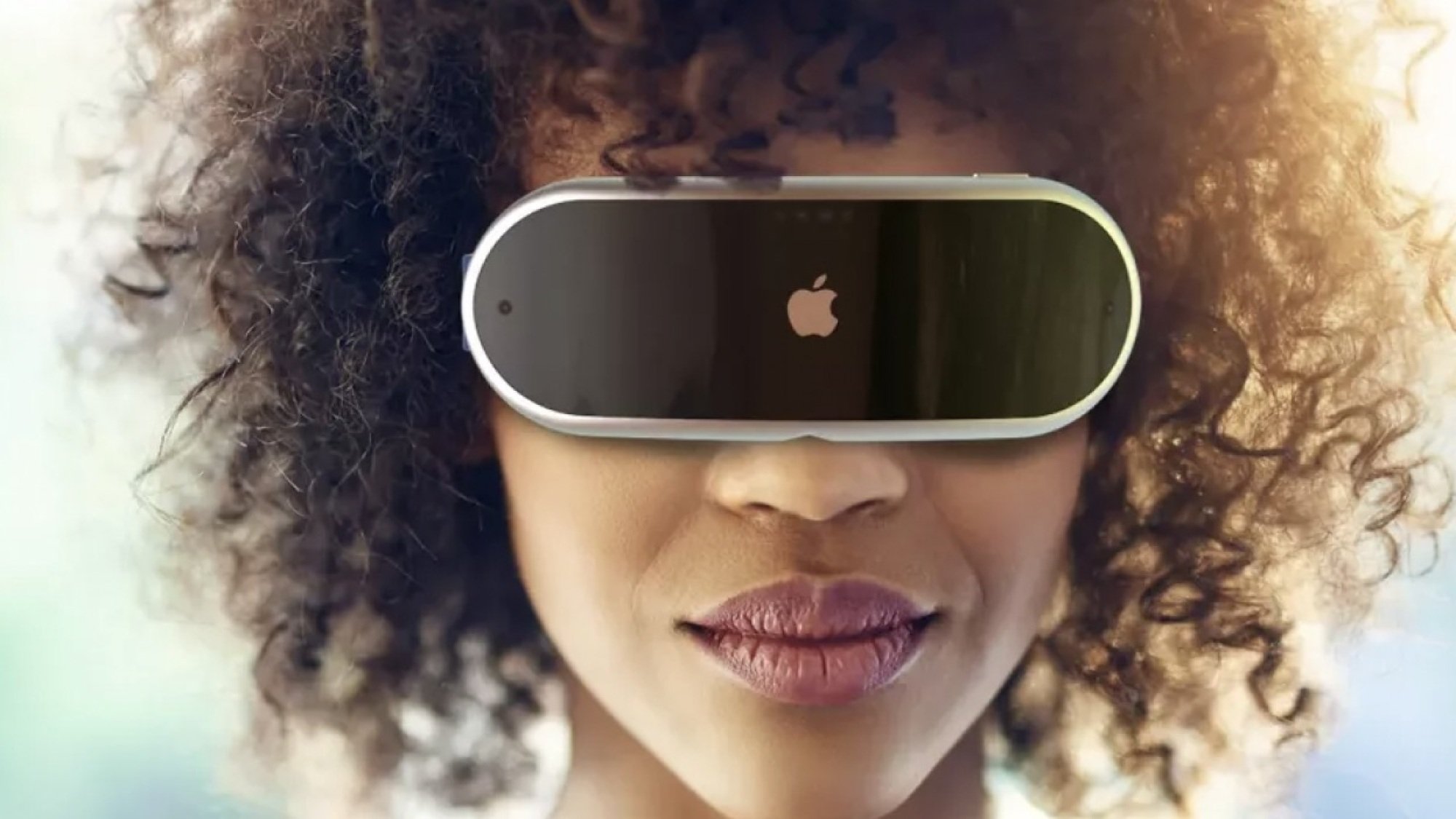image of woman wearing a vr headset with the Apple logo