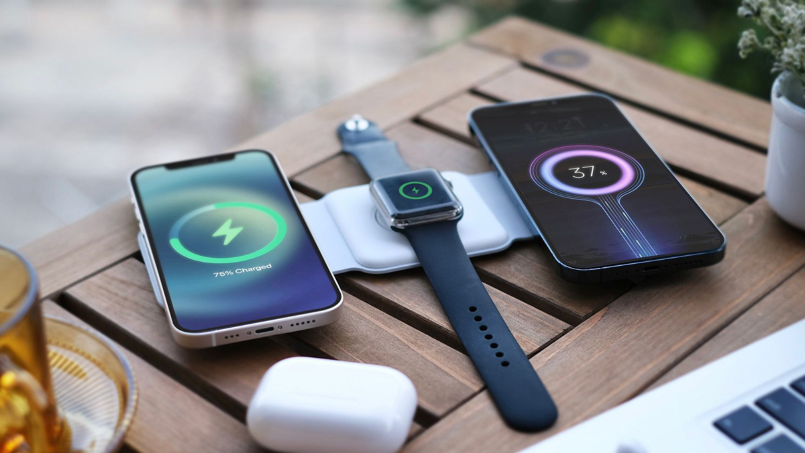 magstack charging station charging two phones and apple watch on picnic table