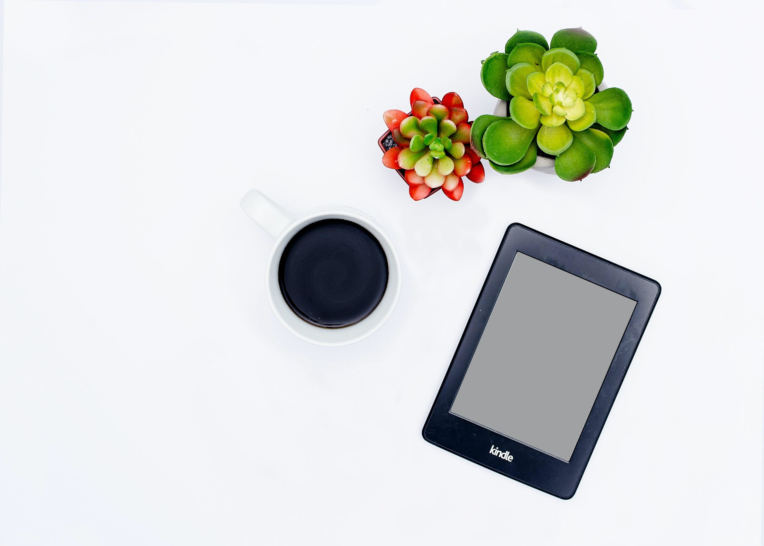 Kindle on white table