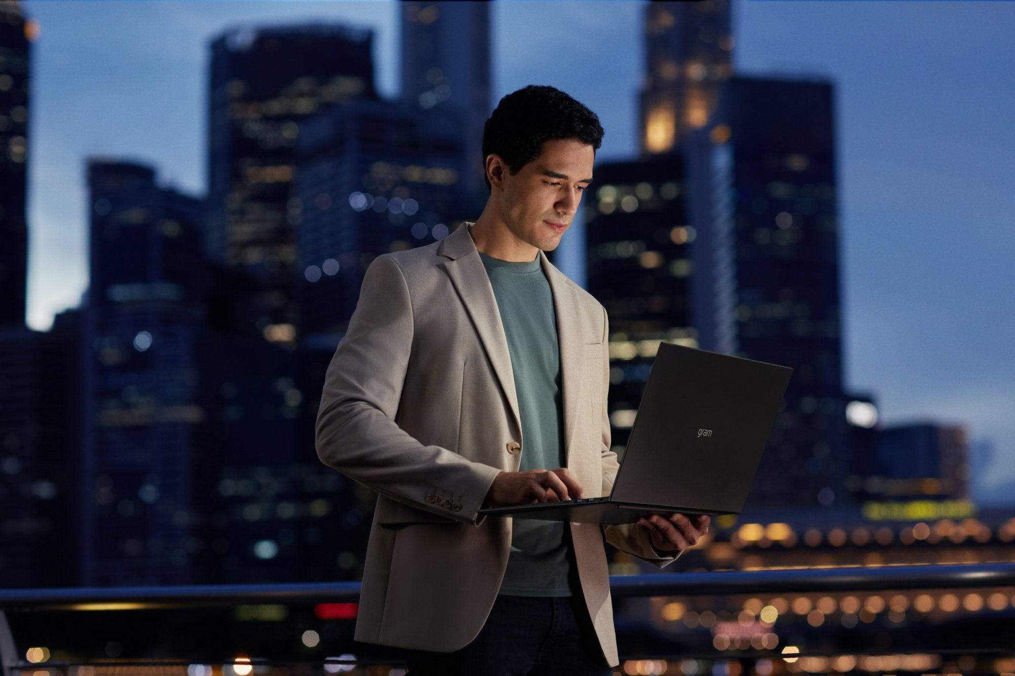 Man holding LG Gram laptop