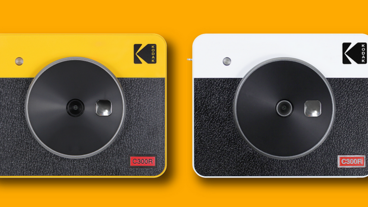Kodak camera and printer on yellow background