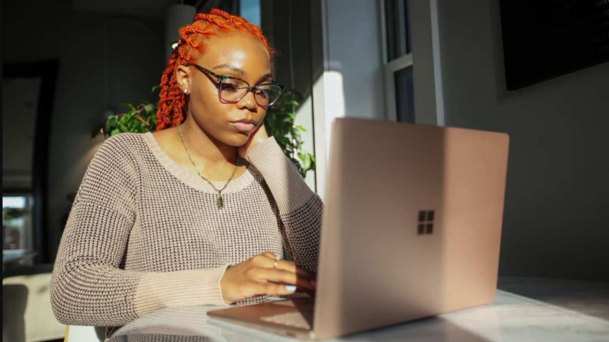 Girl looking at laptop