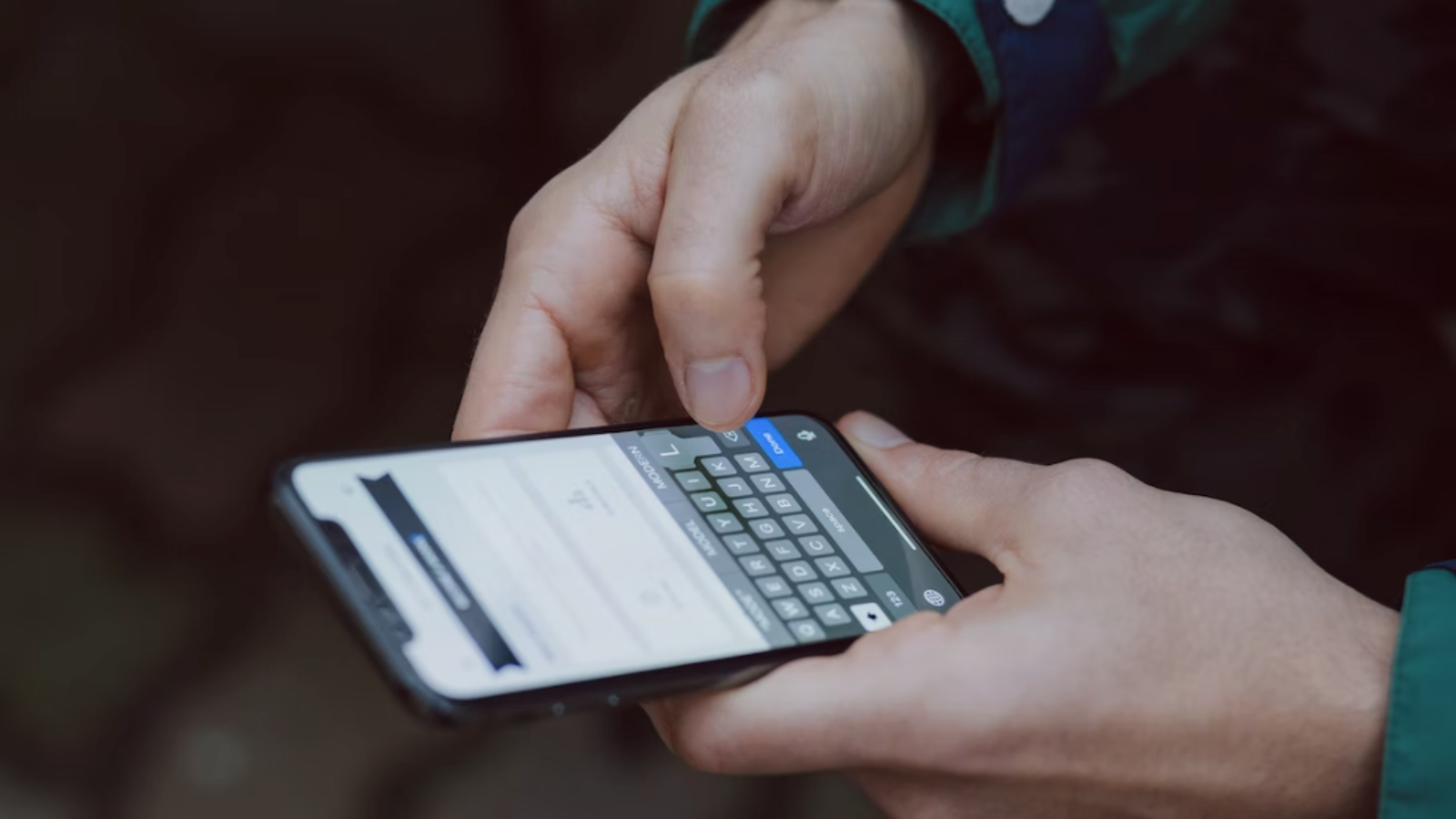 person using phone to scan documents
