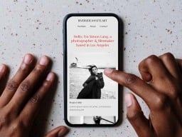 hands pointing to .art domain on phone
