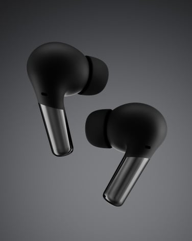 OnePlus Buds Pro 1 earbuds against a gray background.