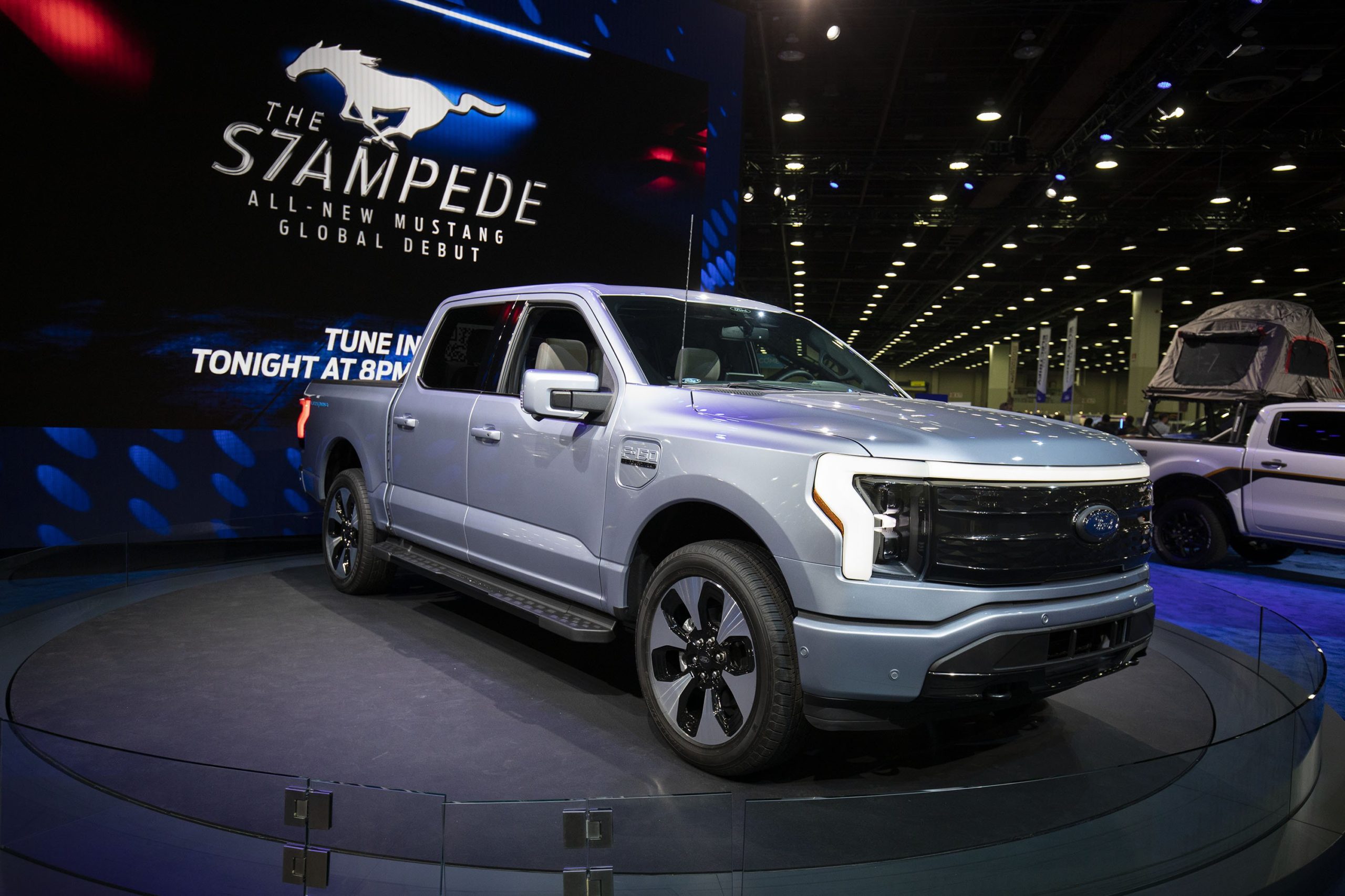 Ford F-150 Lightning on stage at vehicle show