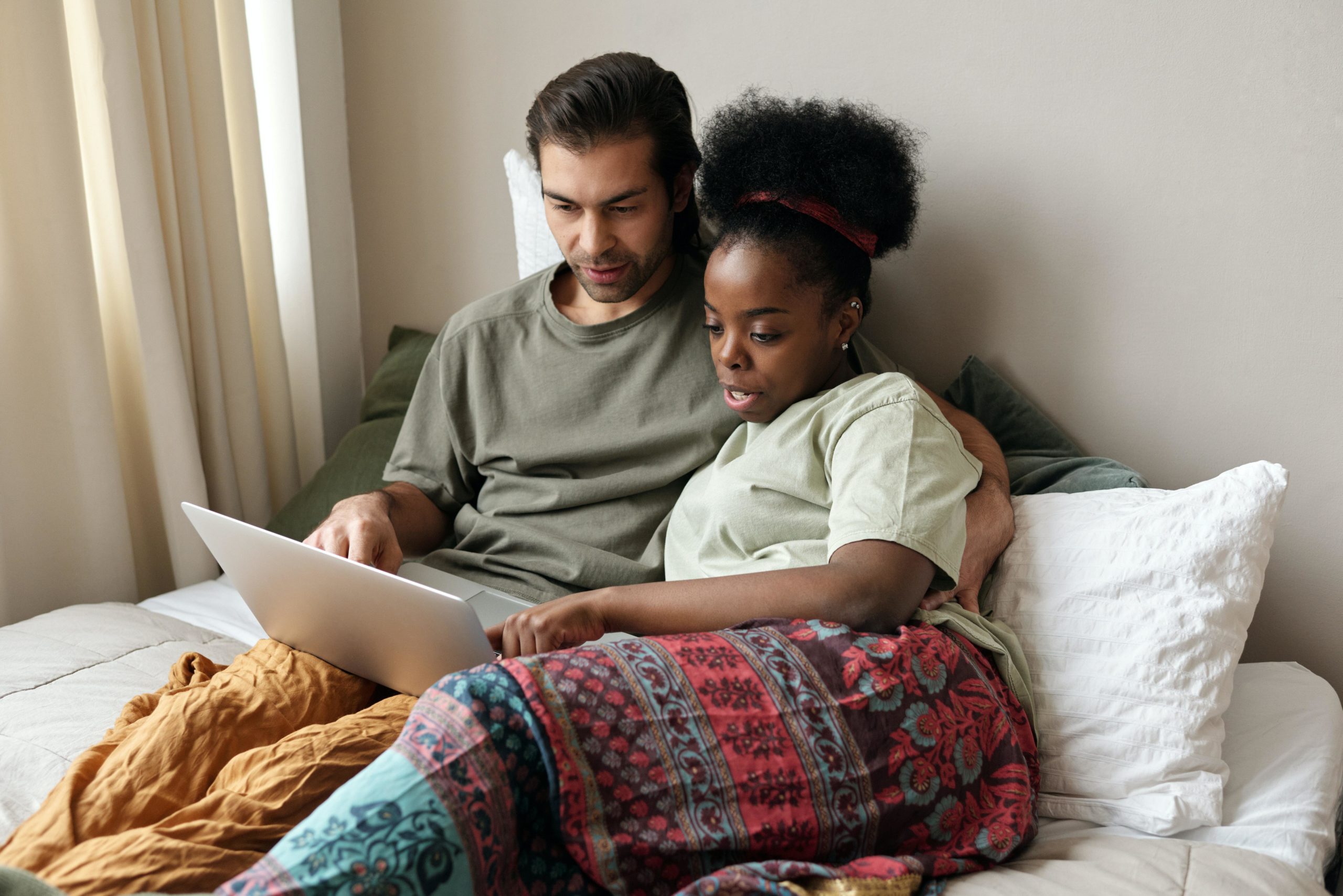 Couple watching laptop